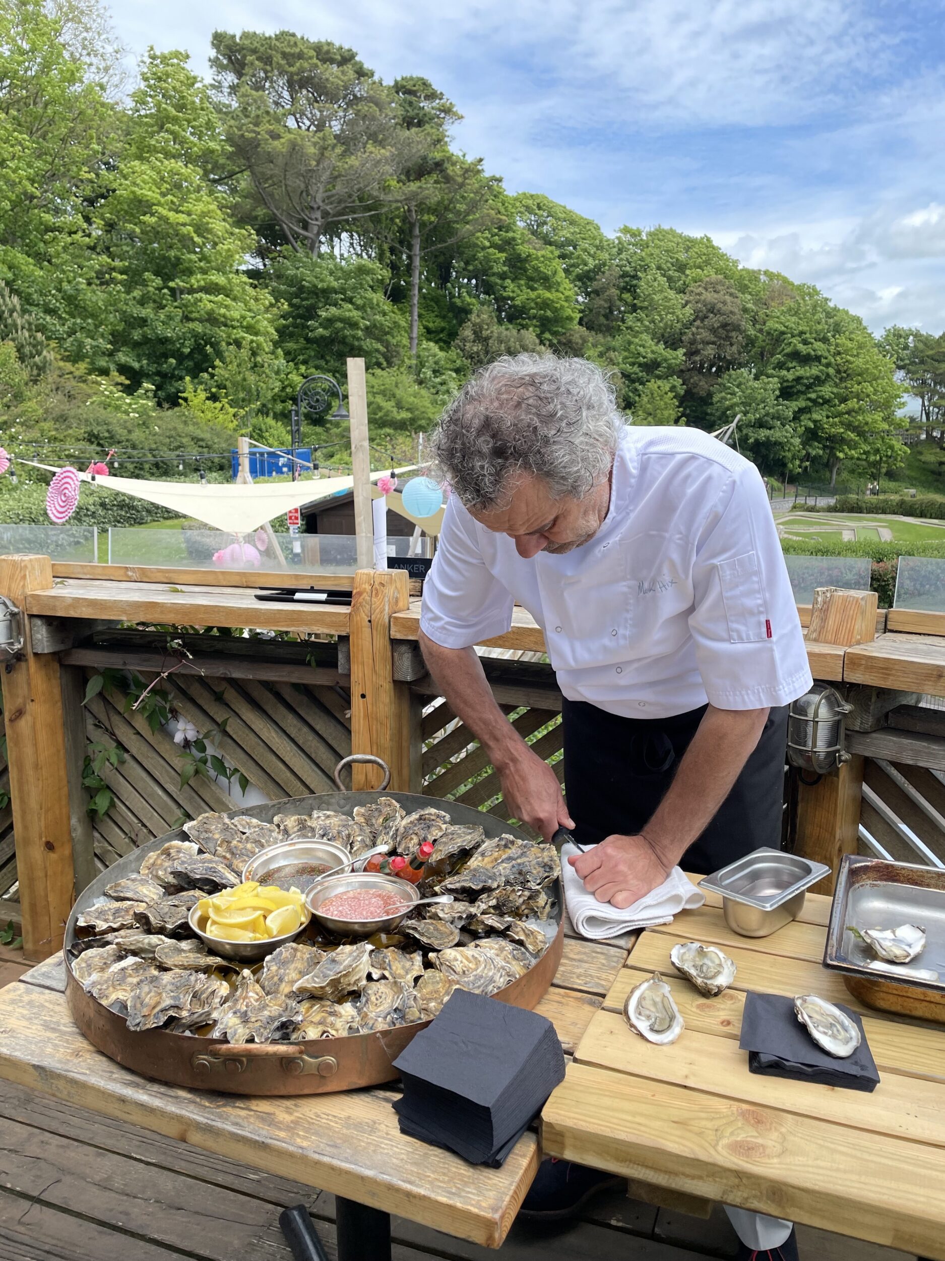 mark shucking oysters